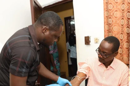 A picture of delsu staff taking medication
