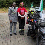 attracta beside her bike